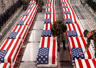 Forbidden photo of U.S. soldiers, killed in the Iraq war, returning in caskets draped with the American flag